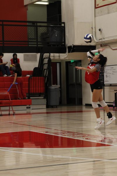  Ximena Caldera Ibarra (12) jump serving into their win against Pinnacle 
